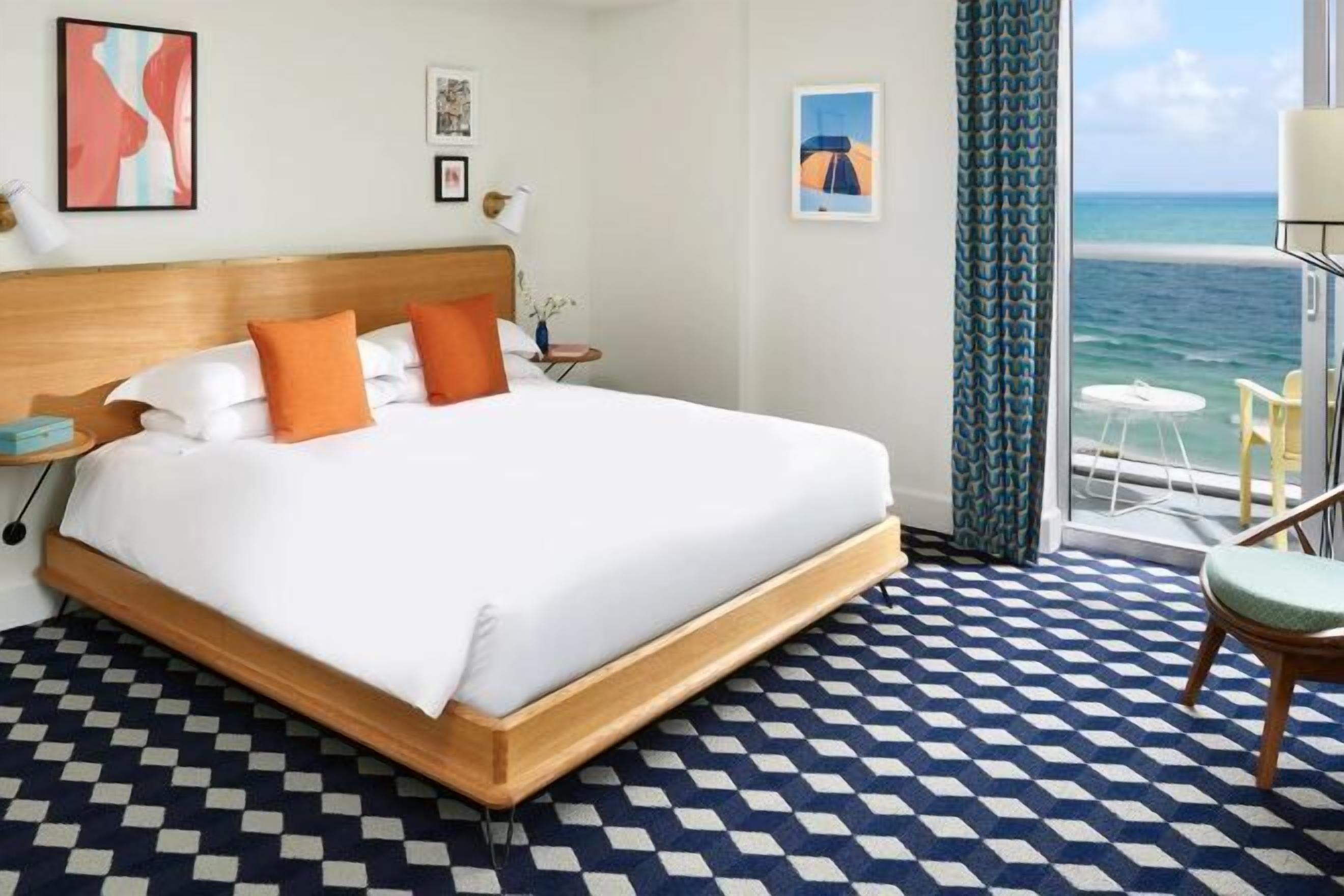 Premium bedding, down comforters, in-room safe, desk