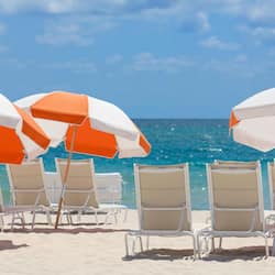 On the beach, sun loungers, beach umbrellas, beach towels