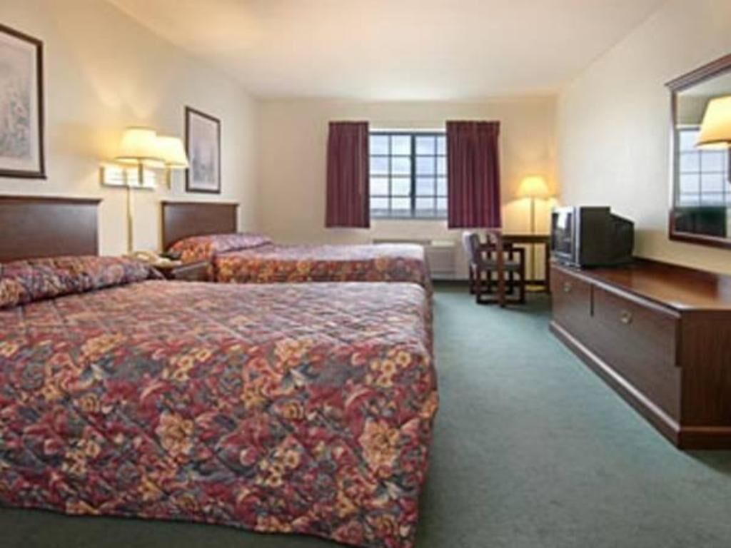Desk, laptop workspace, blackout curtains, iron/ironing board