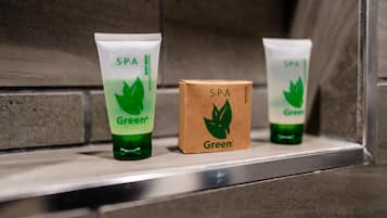 Three spa products on a shelf.