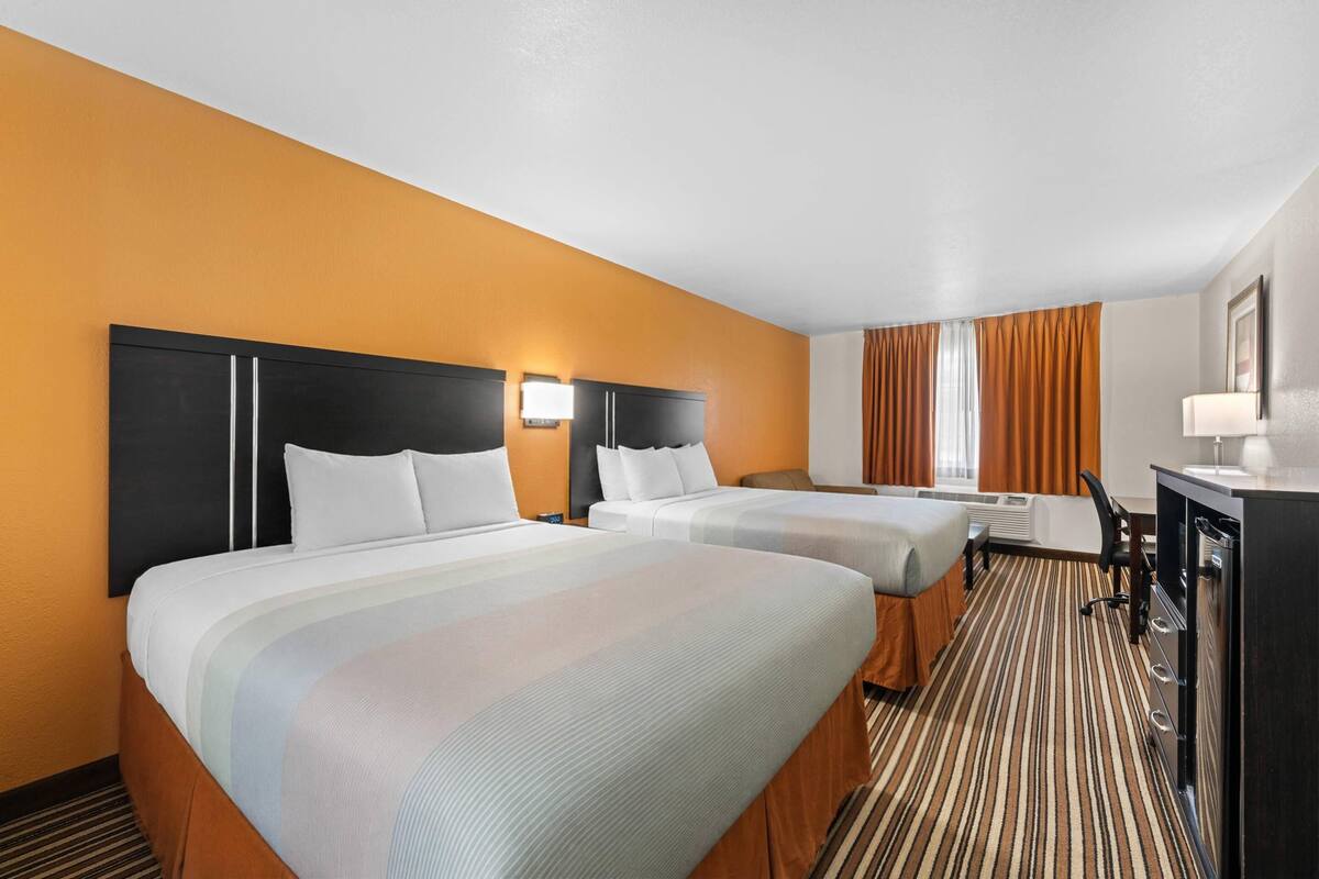 Standard Room, Non Smoking (2 Queen Beds & 1 Sofa Bed) | Desk, iron/ironing board, WiFi (free), bed sheets