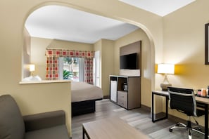 Suite, 1 King Bed with Sofa bed, Non Smoking | Desk, laptop workspace, blackout drapes, soundproofing