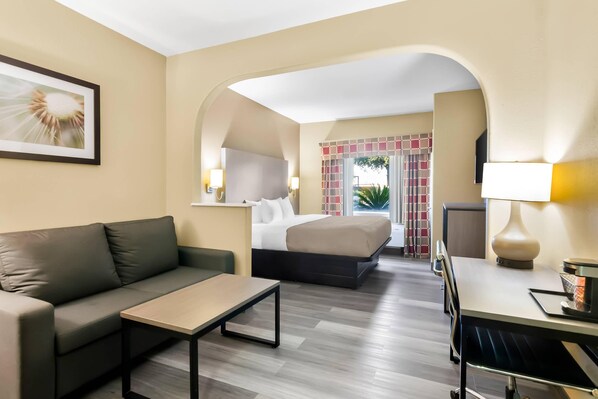 Suite, 1 King Bed with Sofa bed, Non Smoking | Desk, laptop workspace, blackout drapes, soundproofing