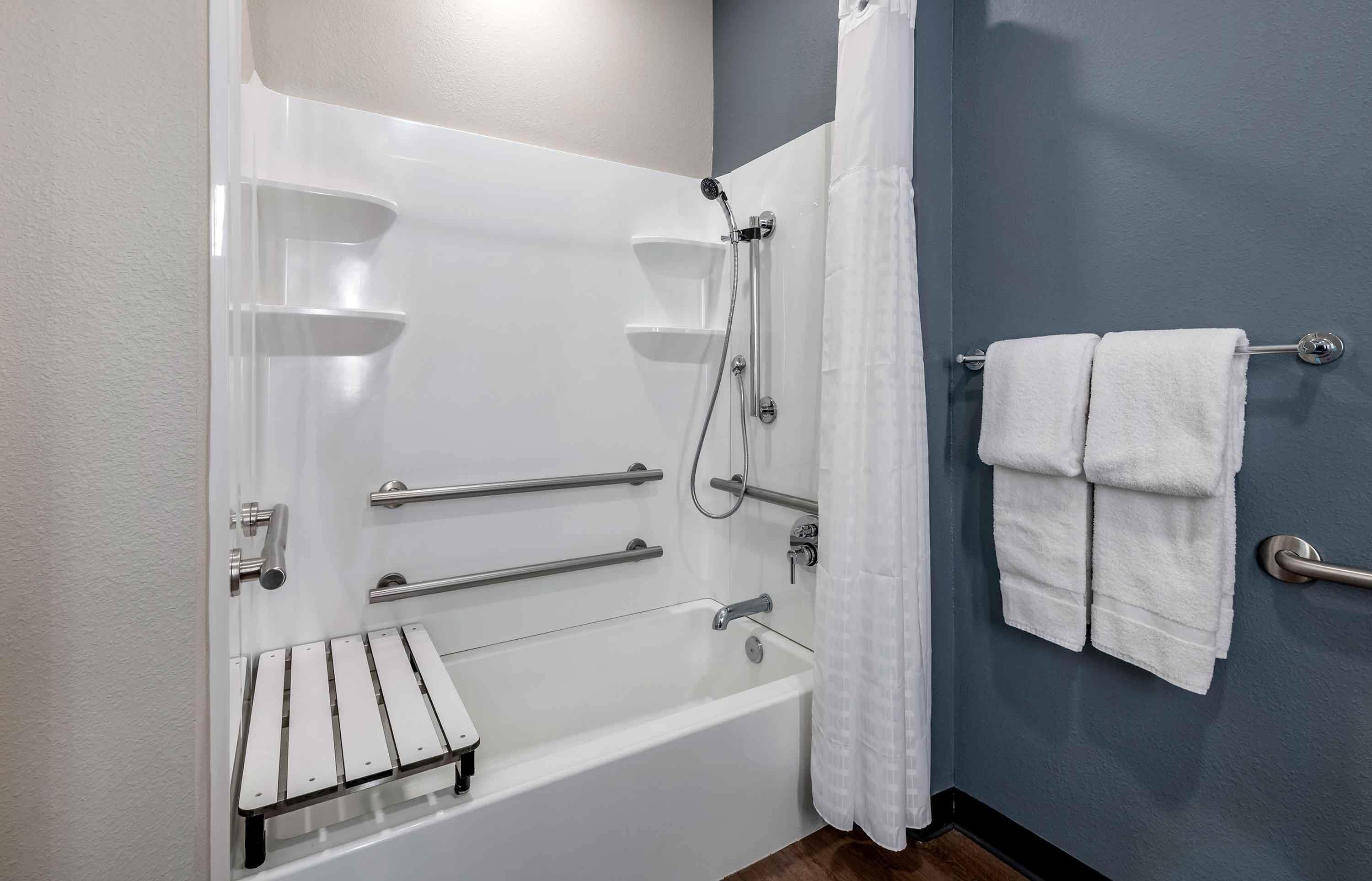 studio, 1 queen bed, accessible, non smoking | bathroom | bathtub, free toiletries, hair dryer, towels