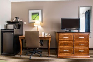 Premium bedding, desk, laptop workspace, iron/ironing board