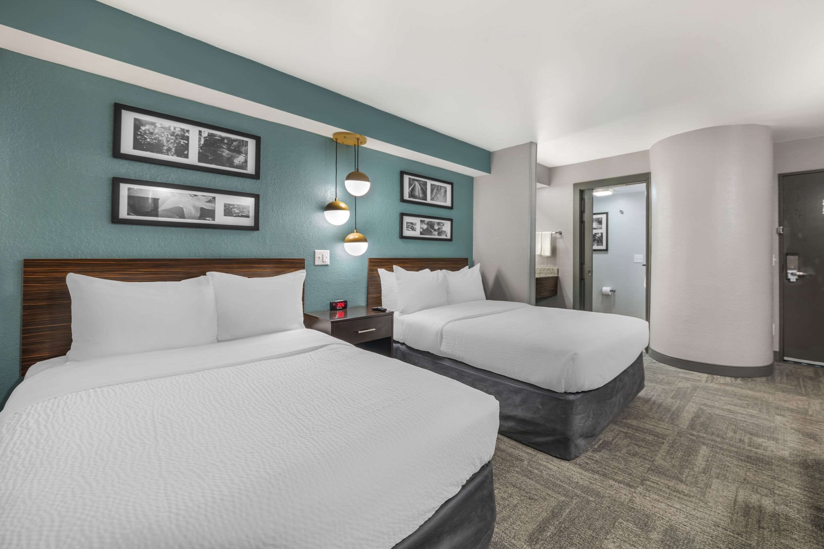 standard room, 2 double beds, non smoking | in-room safe, desk, laptop workspace, iron/ironing board