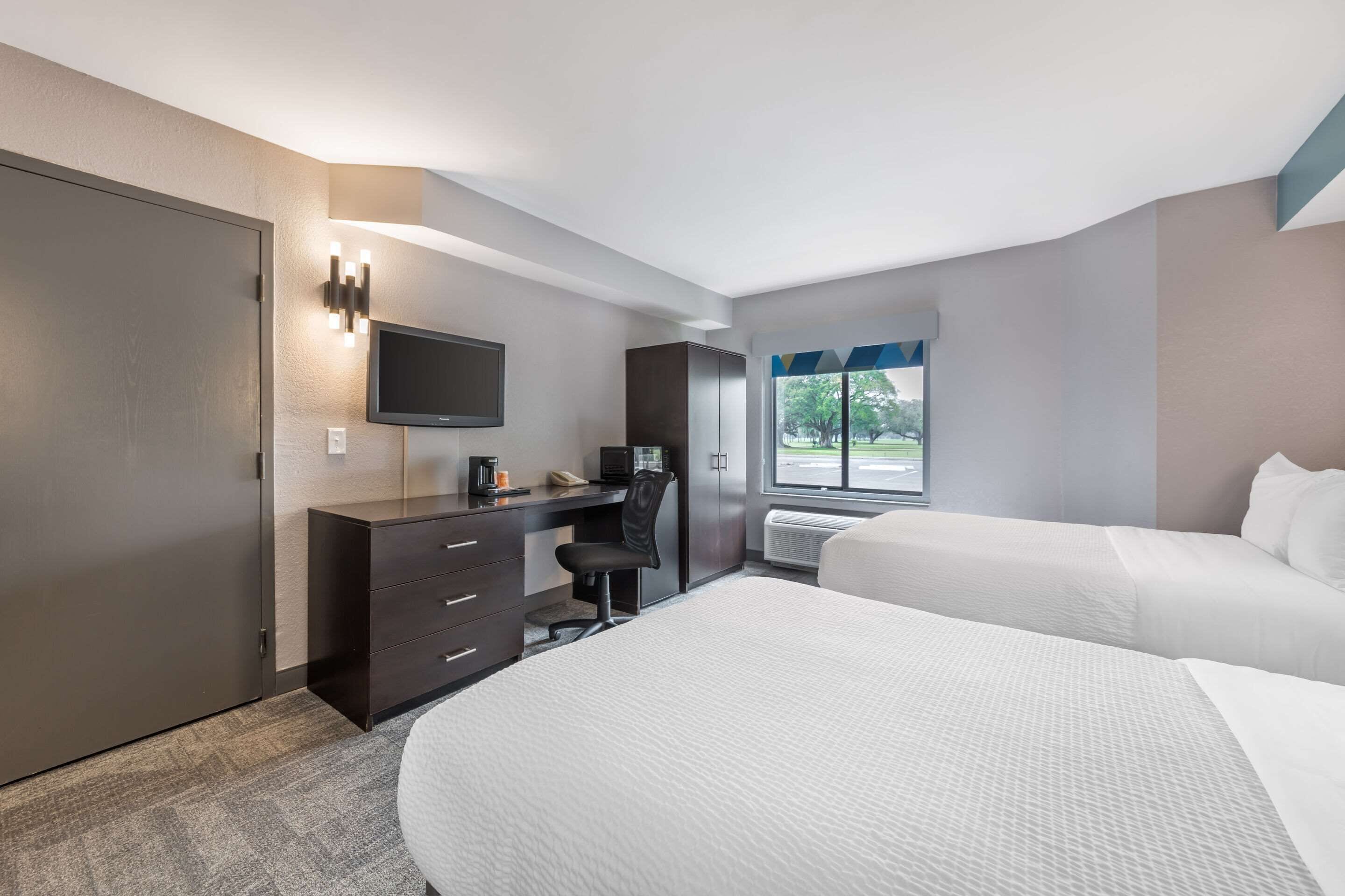 standard room, 2 double beds, non smoking | in-room safe, desk, laptop workspace, iron/ironing board