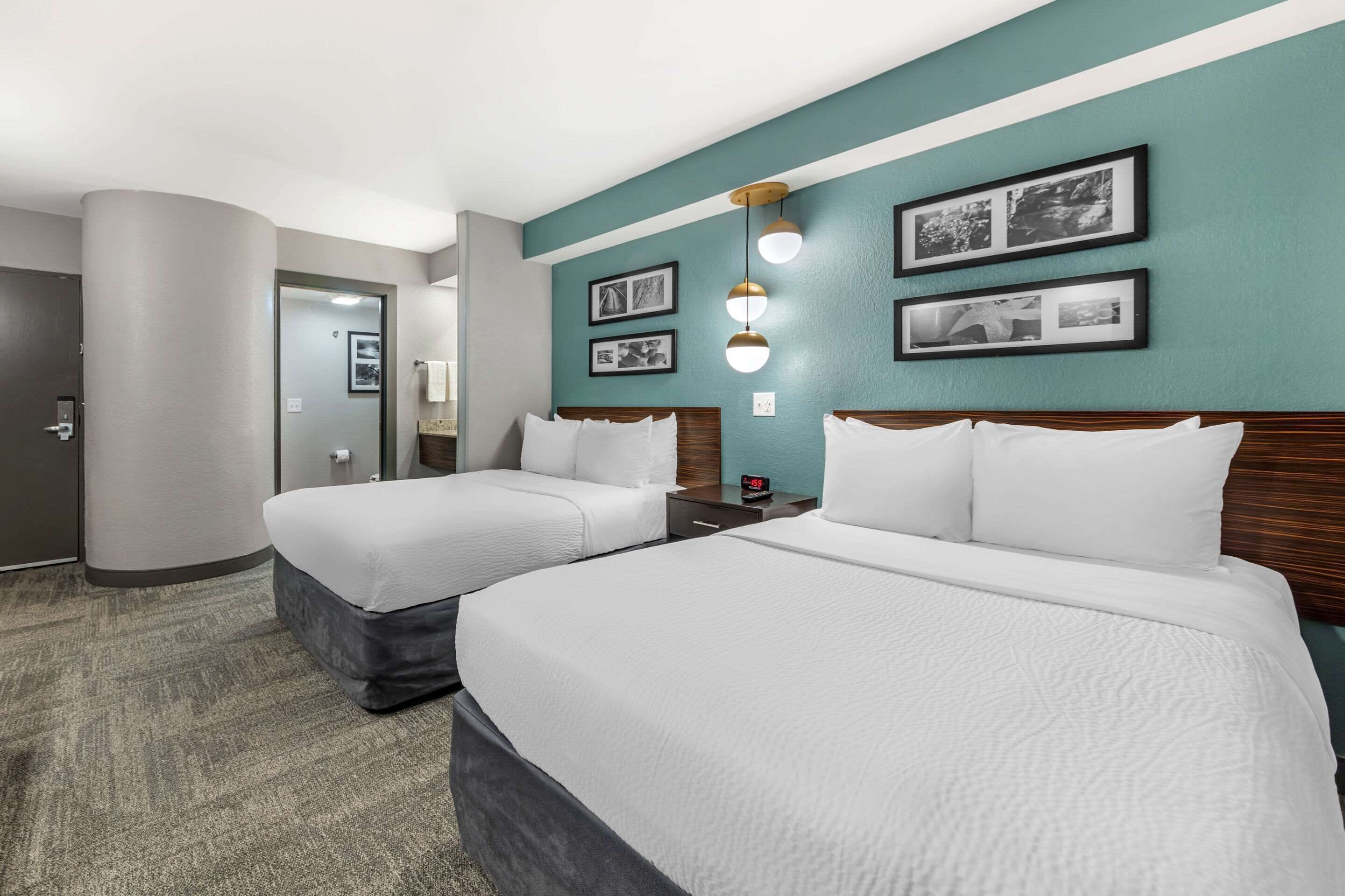 standard room, 2 double beds, non smoking | in-room safe, desk, laptop workspace, iron/ironing board