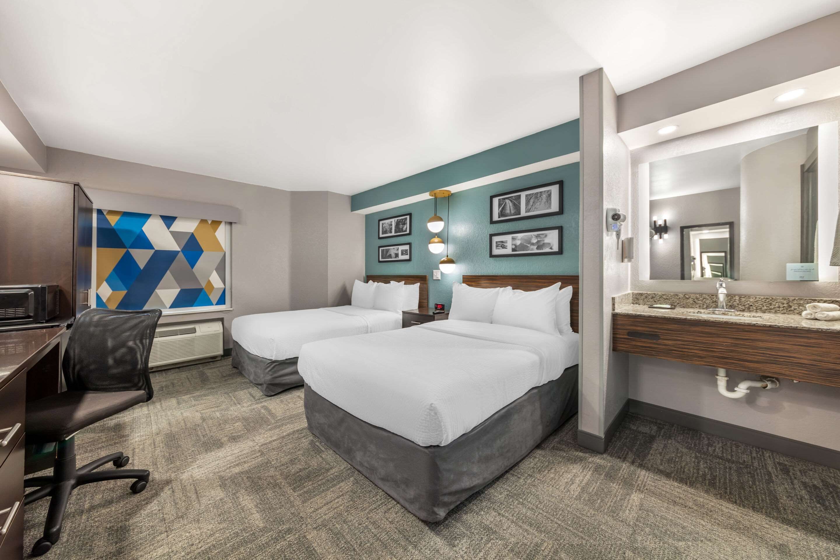 standard room, 2 double beds, non smoking | in-room safe, desk, laptop workspace, iron/ironing board