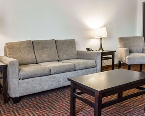 Desk, laptop workspace, blackout drapes, iron/ironing board