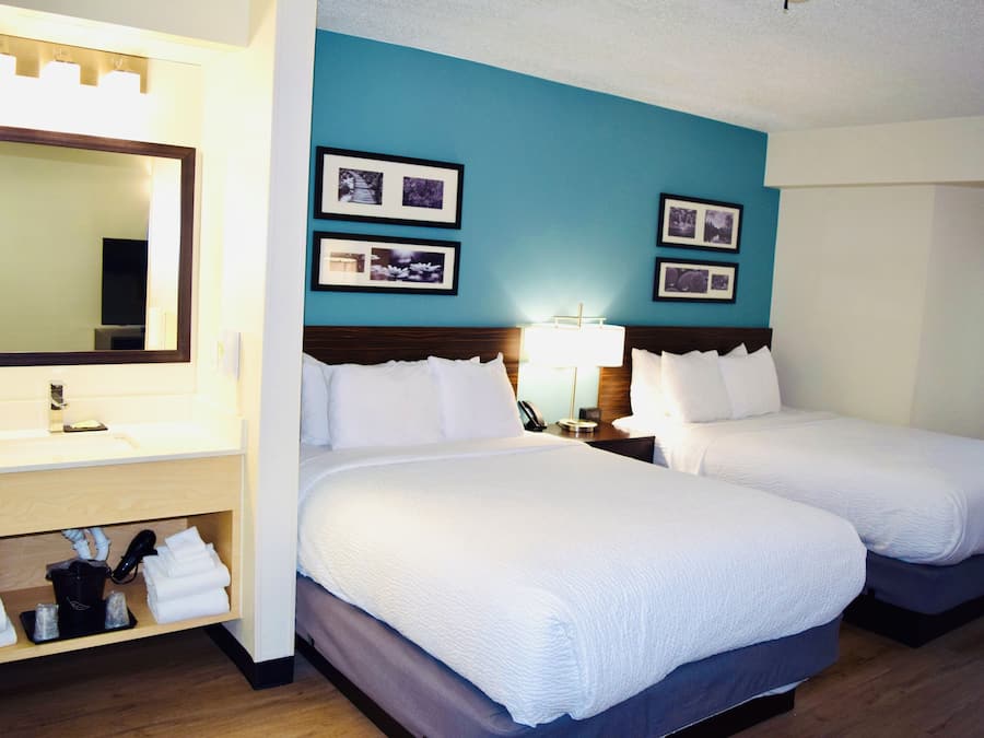 Room, 2 Queen Beds, Non Smoking | In-room safe, desk, laptop workspace, blackout drapes