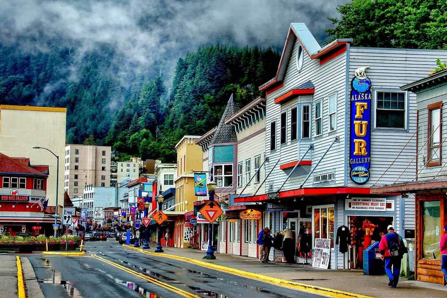 A street with buildings, including a fur store.