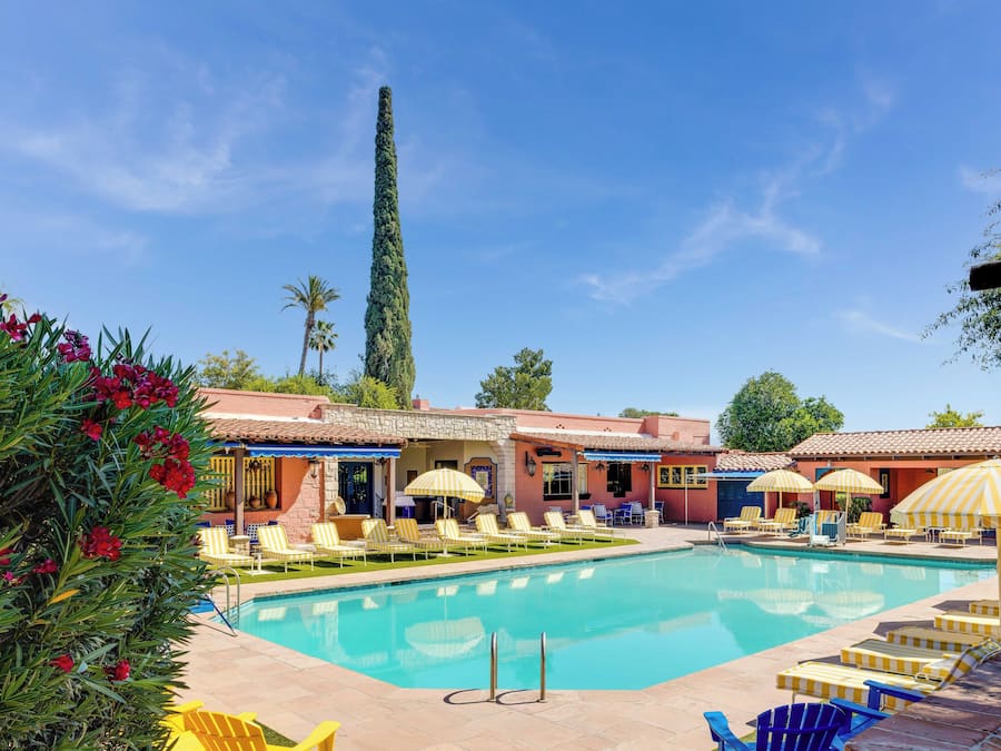 Outdoor pool, open 6:00 AM to 10:00 PM, pool umbrellas, sun loungers