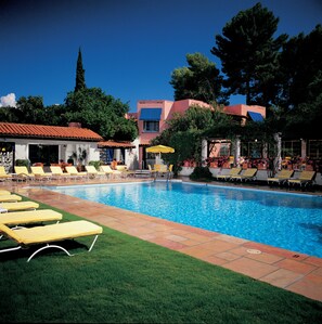 Outdoor pool, open 6:00 AM to 11:00 AM, pool umbrellas, pool loungers