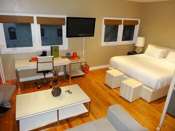 Suite, 1 King Bed with Sofa bed, Ocean View | Down comforters, in-room safe, soundproofing, iron/ironing board at Balboa Inn, On the Beach