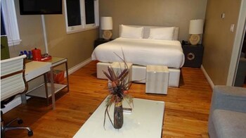 Suite, 1 King Bed with Sofa bed, Ocean View | Down comforters, in-room safe, soundproofing, iron/ironing board at Balboa Inn, On the Beach