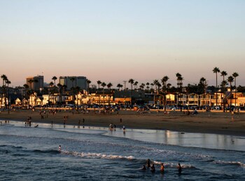 On the beach, white sand, beach towels, beach volleyball at Balboa Inn, On the Beach