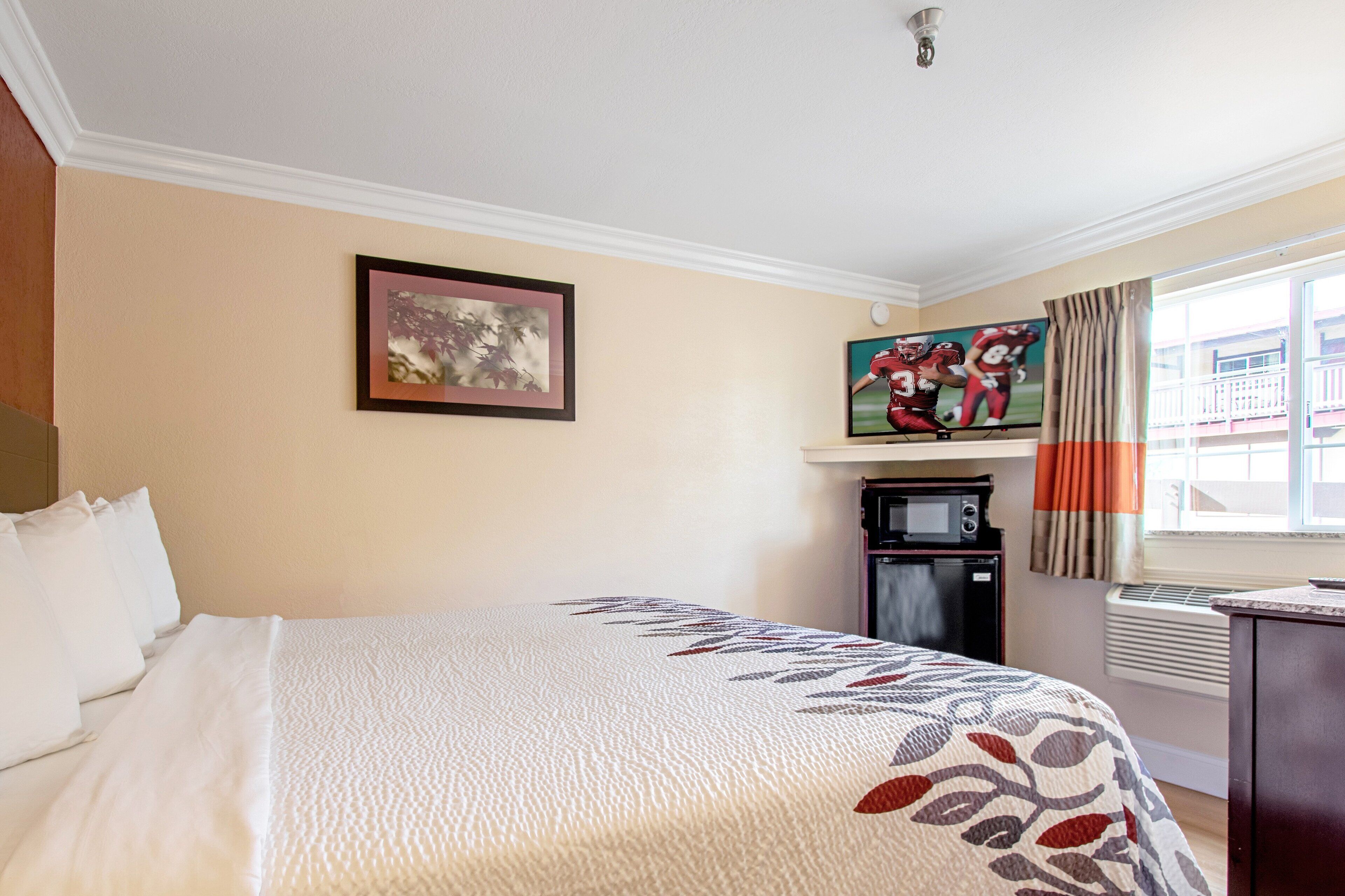 suite, non smoking, jetted tub (2 king beds) | desk, blackout curtains, iron/ironing board, free cots/infant beds