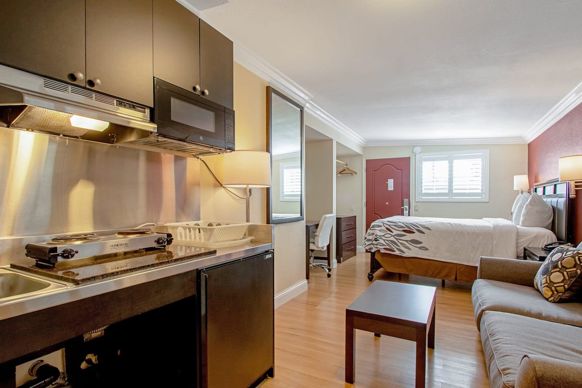 desk, blackout curtains, iron/ironing board, free cots/infant beds