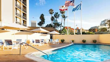 Outdoor pool, pool umbrellas, sun loungers