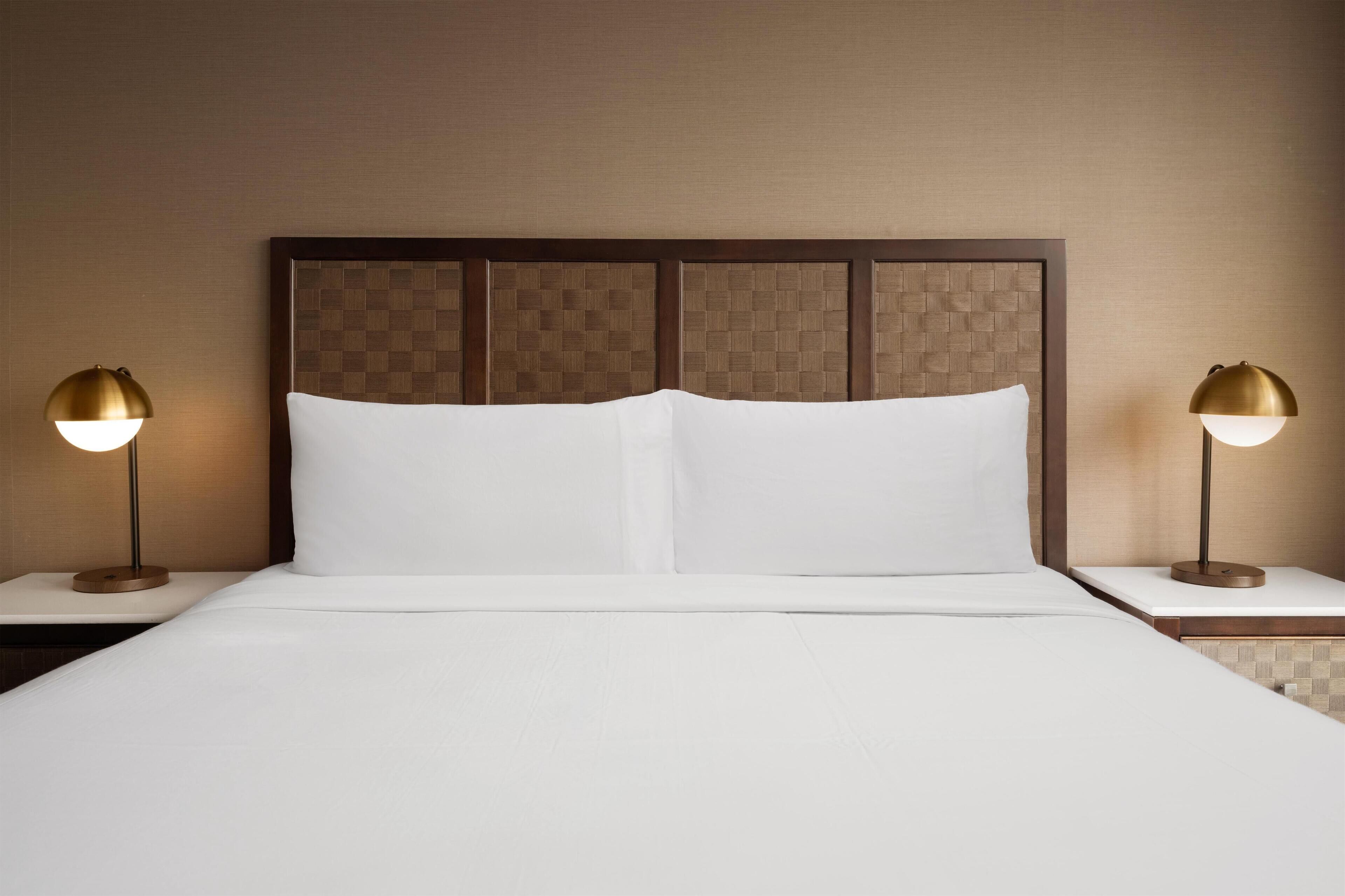 Premium bedding, pillow-top beds, in-room safe, desk