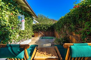 Outdoor pool, pool umbrellas, pool loungers