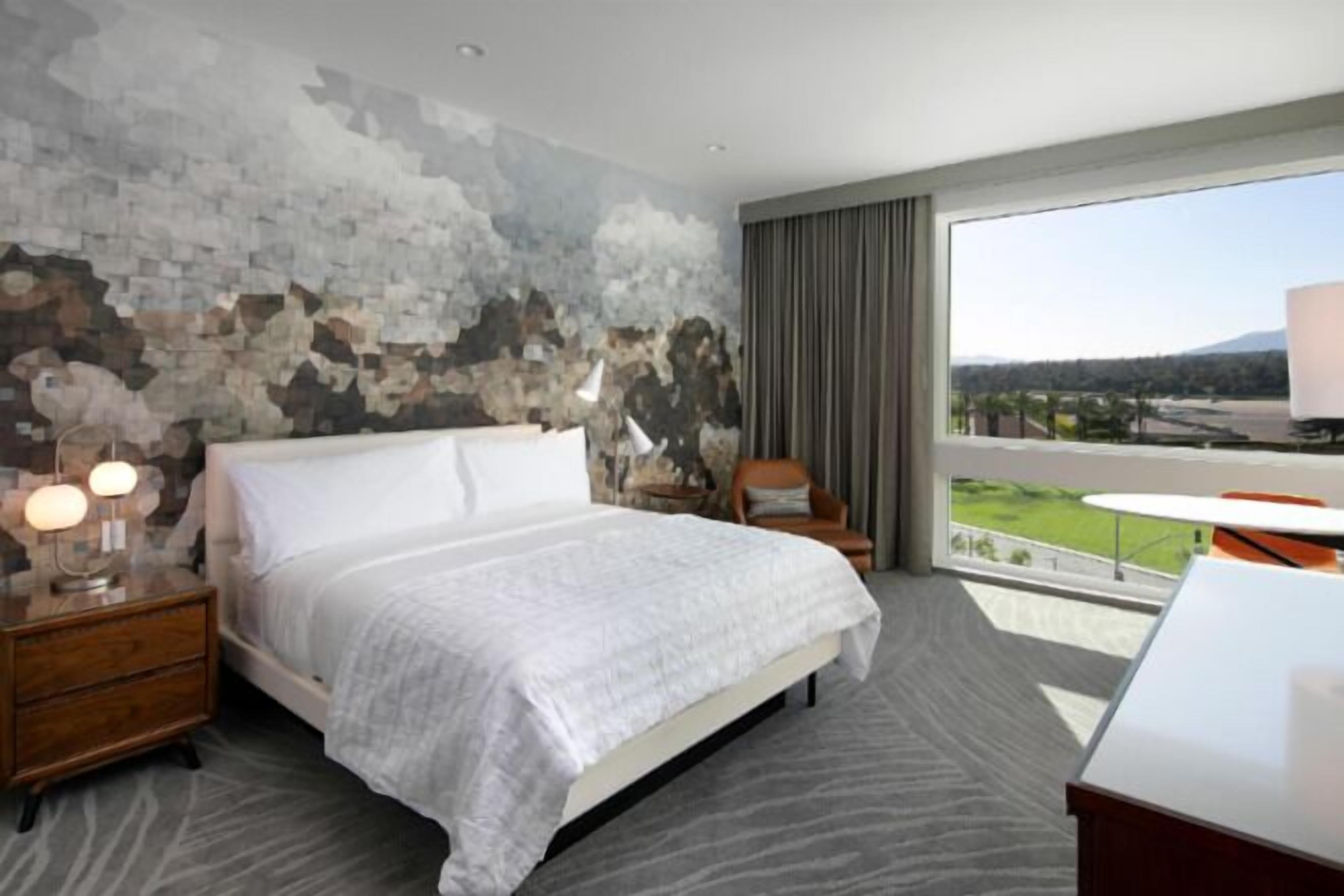 Hypo-allergenic bedding, in-room safe, desk, laptop workspace