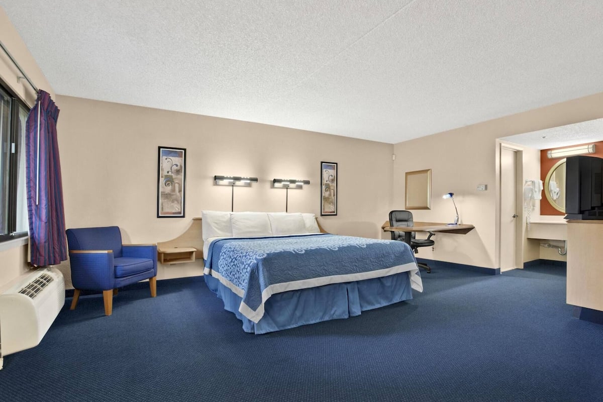 Pillowtop beds, desk, blackout drapes, iron/ironing board