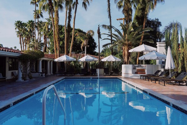 3 outdoor pools, open 7:00 AM to midnight, free cabanas, pool umbrellas