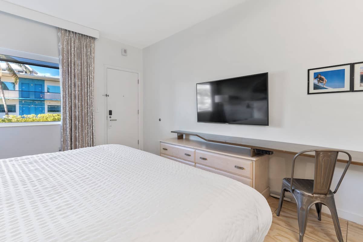 Premium bedding, down duvets, pillow-top beds, in-room safe