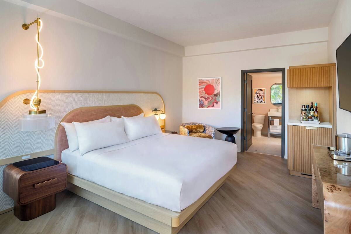 Premium bedding, down comforters, pillowtop beds, minibar