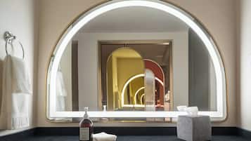 Premium bedding, down comforters, pillowtop beds, in-room safe