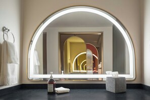 Premium bedding, down comforters, pillowtop beds, in-room safe