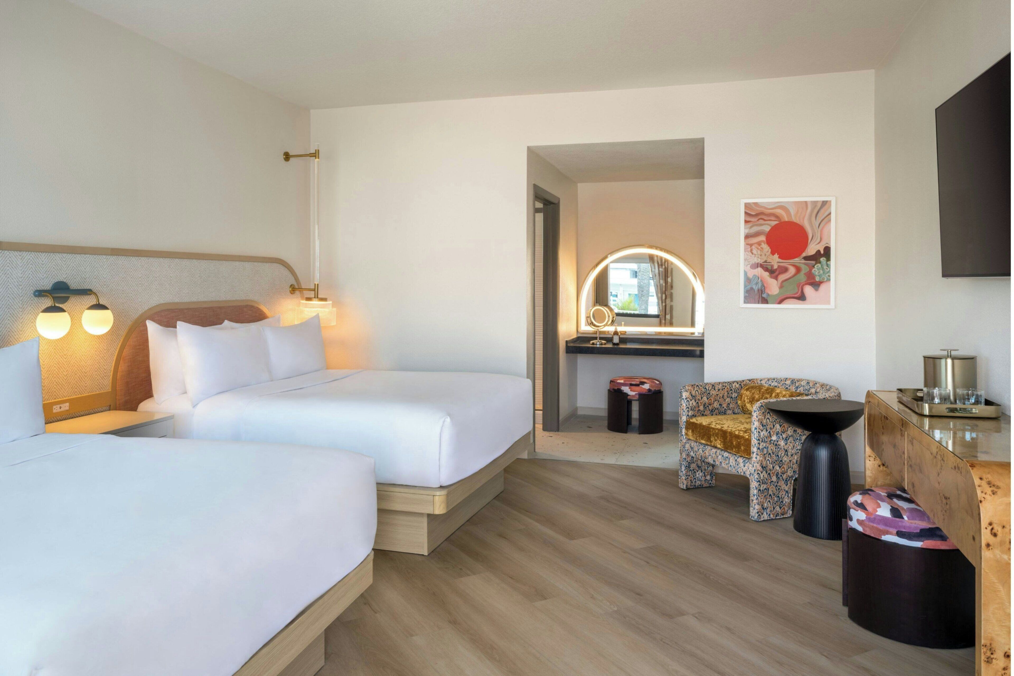 Premium bedding, down comforters, pillowtop beds, in-room safe
