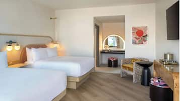 Premium bedding, down comforters, pillowtop beds, in-room safe