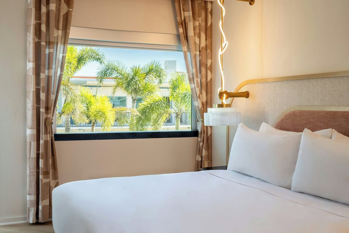 Premium bedding, down comforters, pillowtop beds, in-room safe