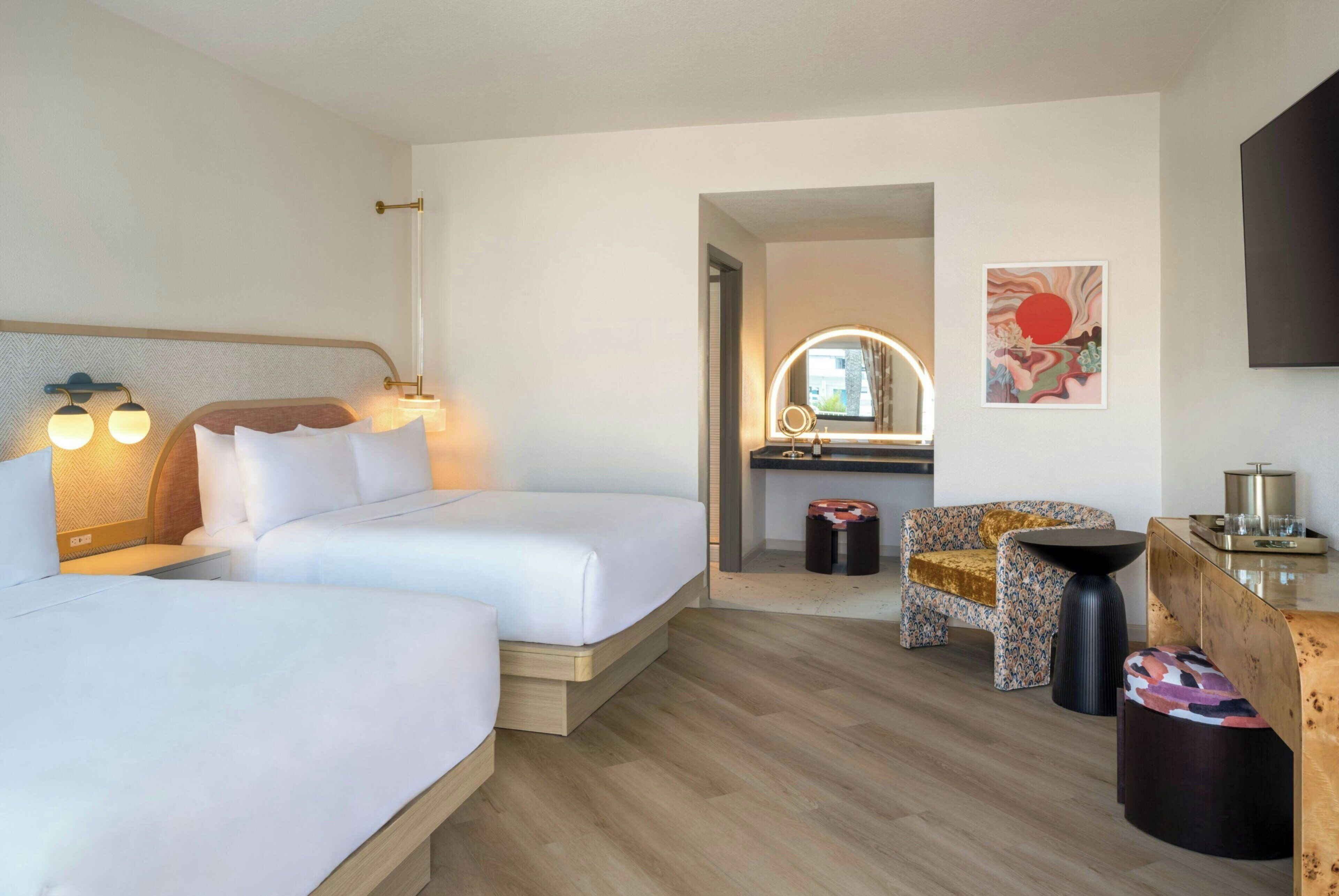 Premium bedding, down comforters, pillowtop beds, in-room safe