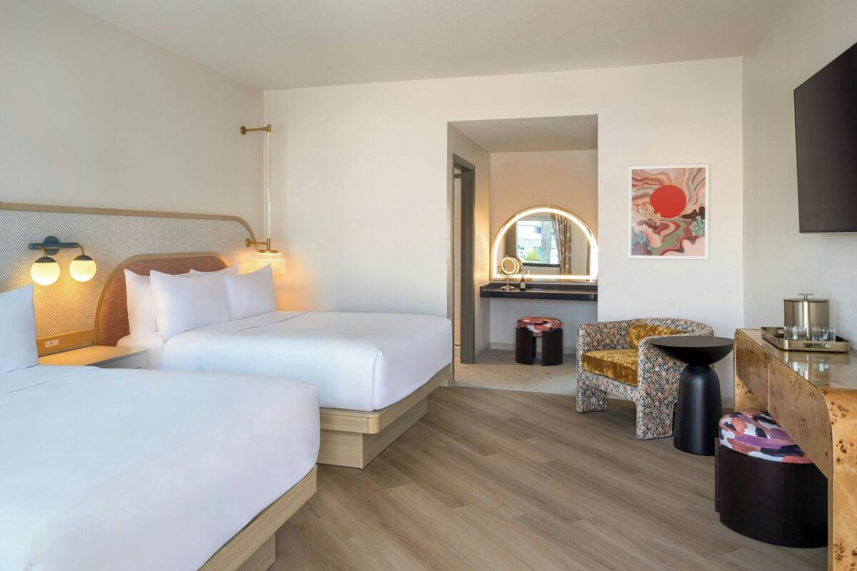 Premium bedding, down comforters, pillowtop beds, minibar