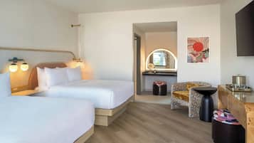 Premium bedding, down comforters, pillowtop beds, in-room safe