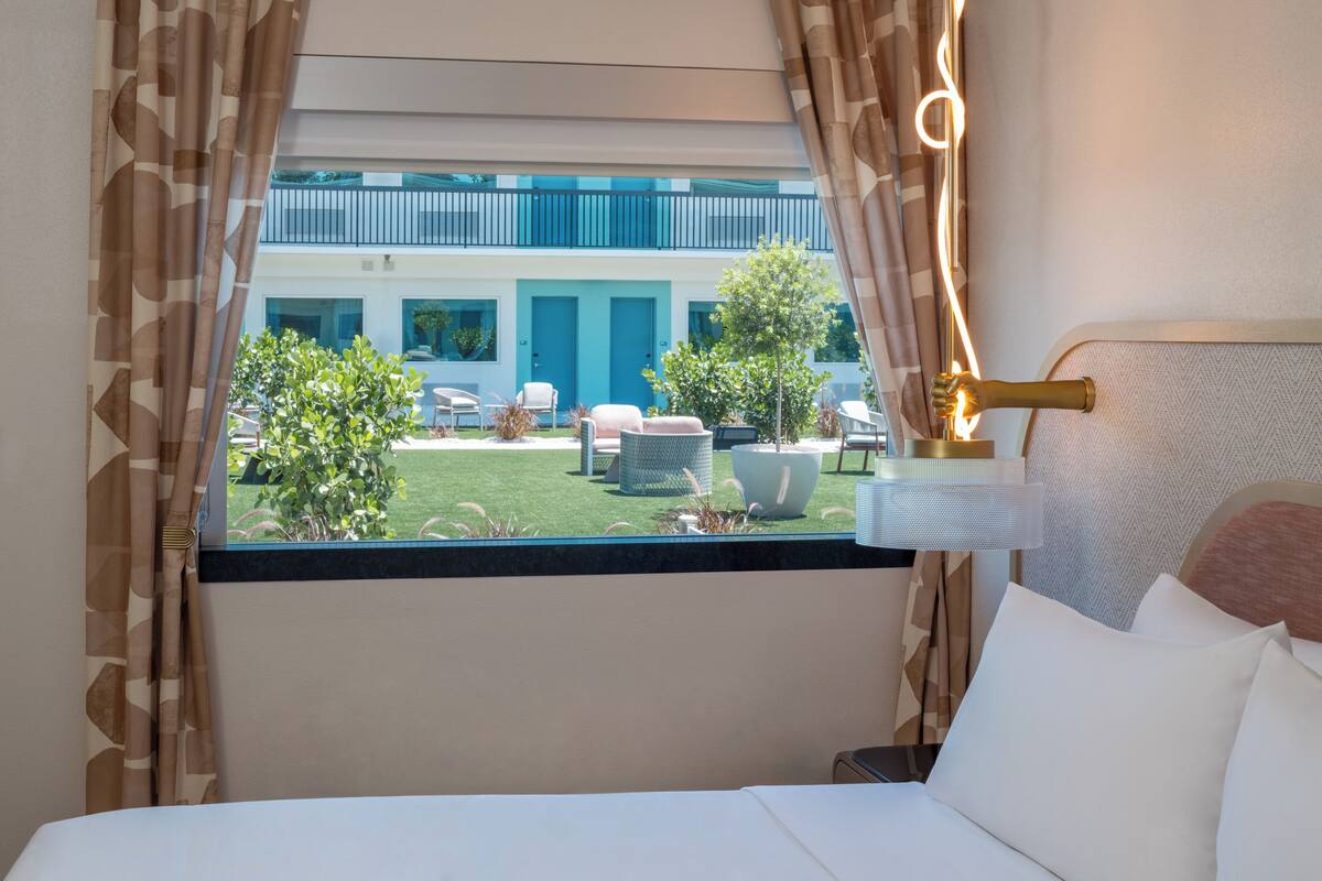 Premium bedding, down comforters, pillowtop beds, minibar