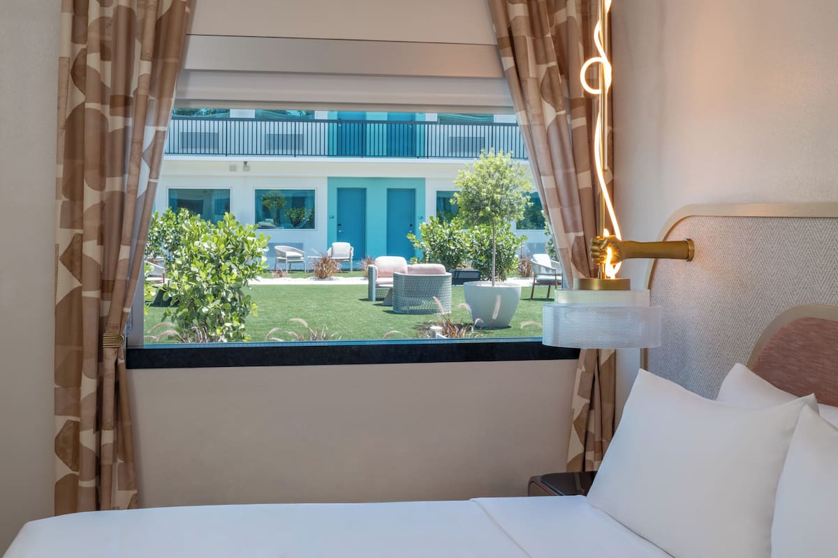 Premium bedding, down comforters, pillowtop beds, in-room safe