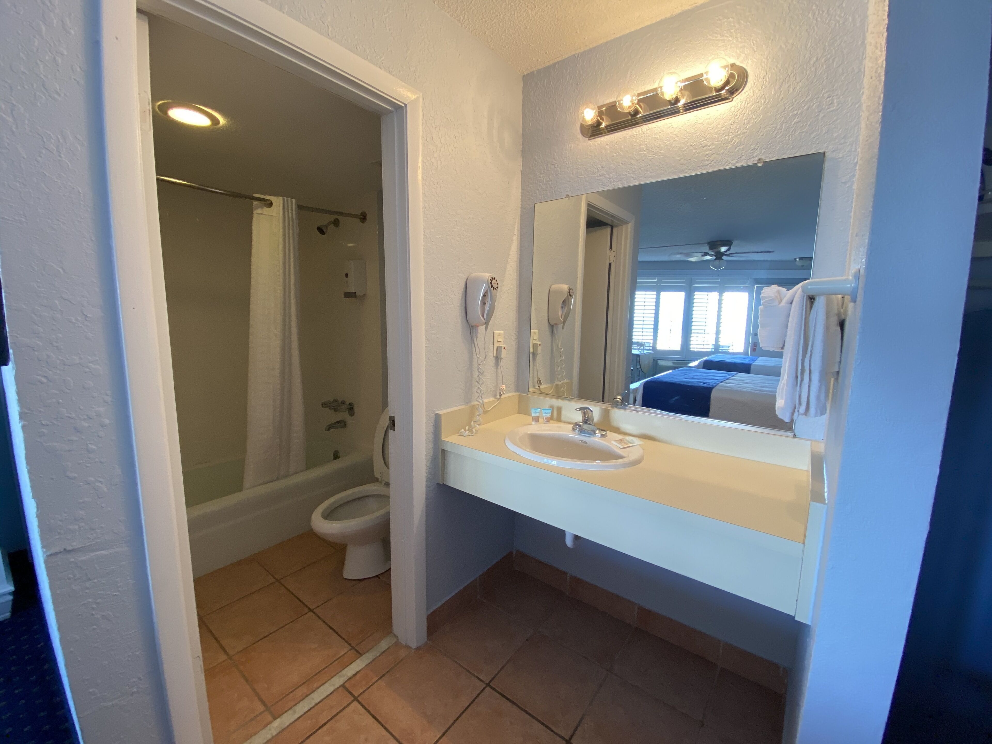standard room, 2 queen beds, ocean view | bathroom | shower, hair dryer, towels, soap