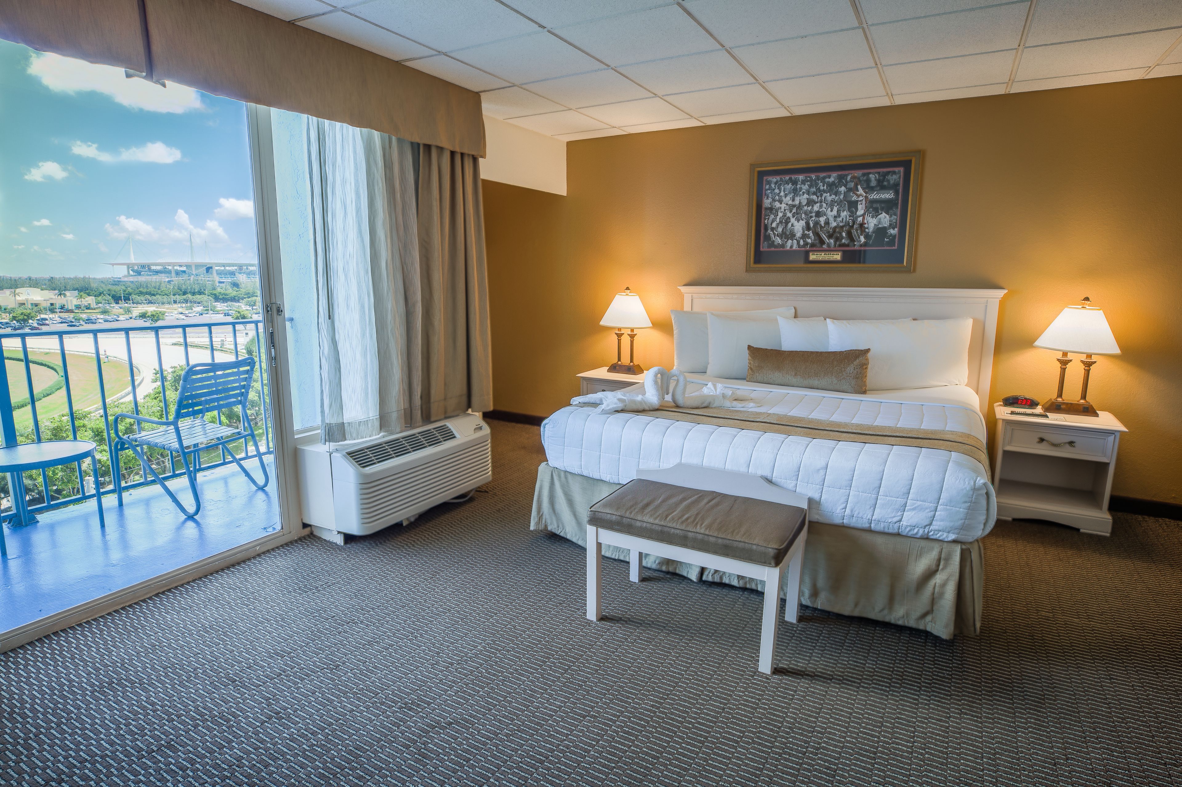 corner king track side room | 1 bedroom, premium bedding, in-room safe, desk