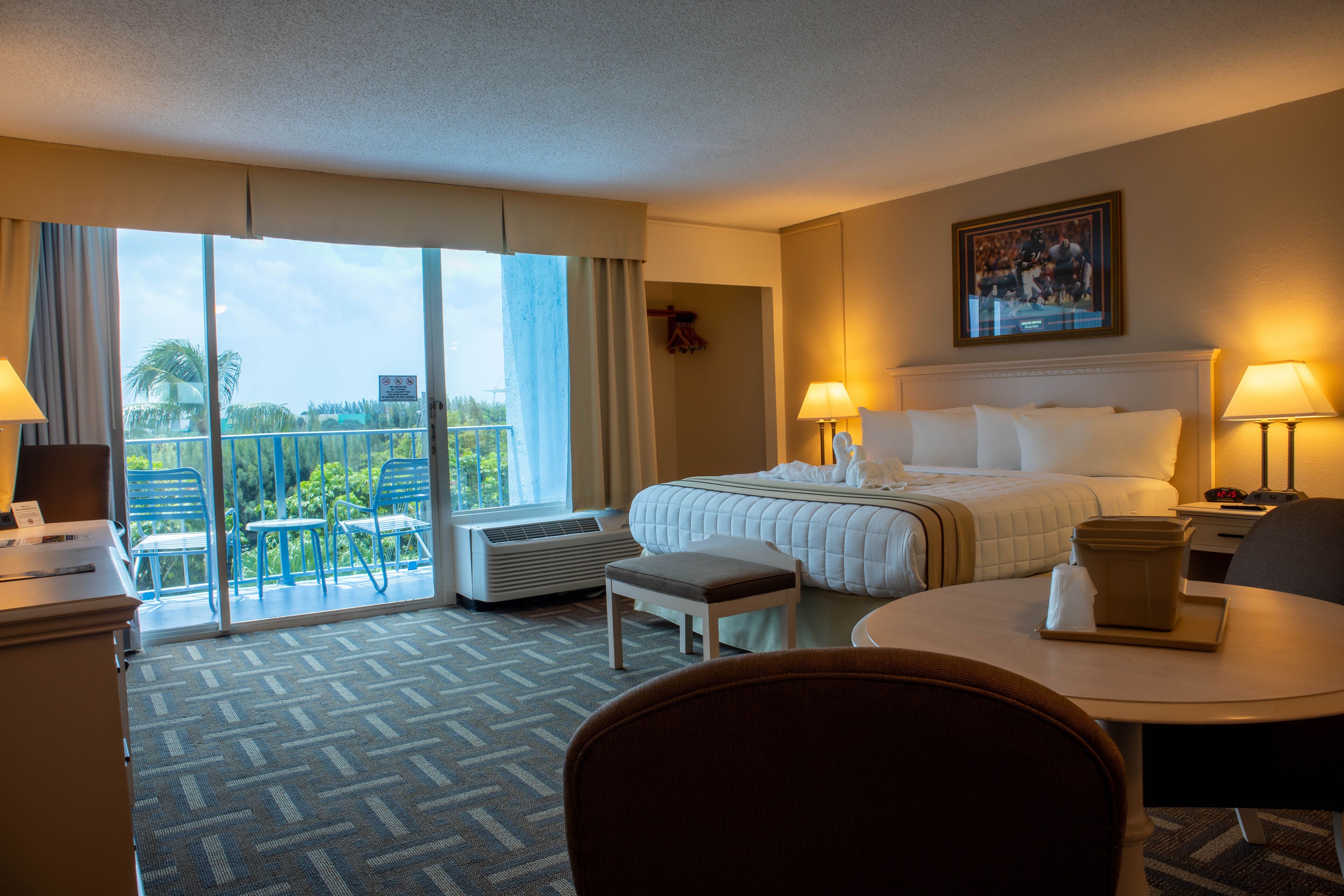 corner king track side room | 1 bedroom, premium bedding, in-room safe, desk