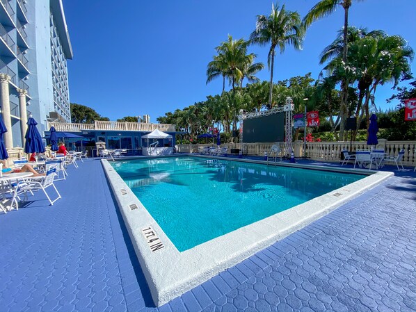 Outdoor pool, open 7:00 AM to 9:00 PM, pool umbrellas, pool loungers