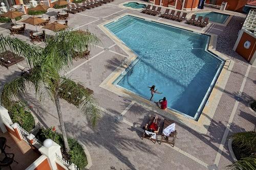 2 outdoor pools, pool umbrellas, sun loungers