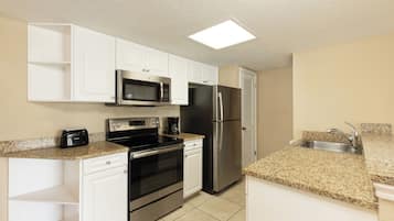 Fridge, microwave, coffee/tea maker, paper towels