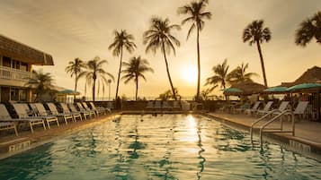 Outdoor pool, pool umbrellas, sun loungers
