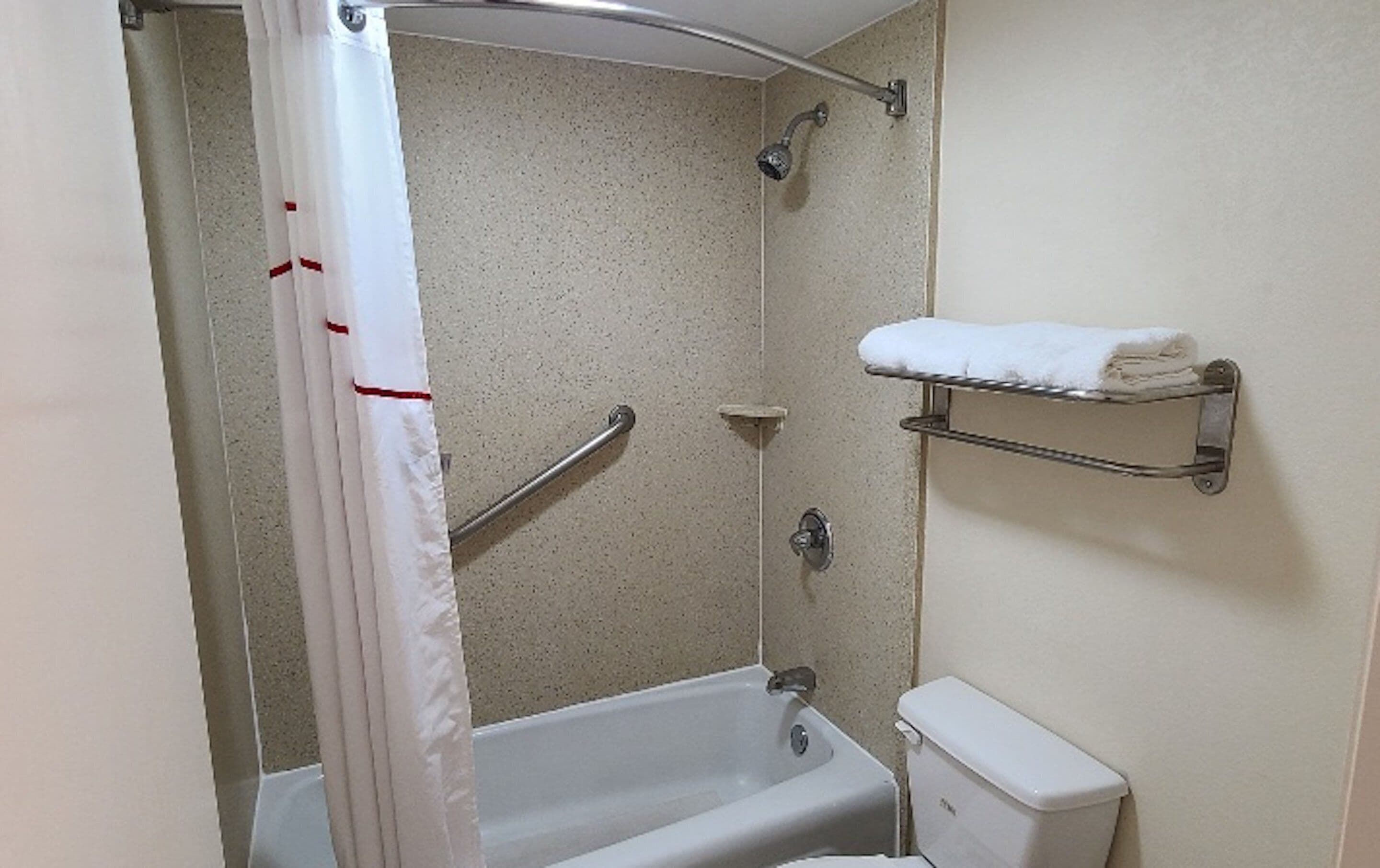 combined shower/bathtub, free toiletries, hair dryer, towels