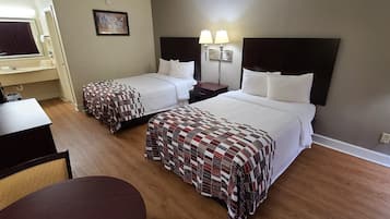 Premium bedding, desk, laptop workspace, iron/ironing board